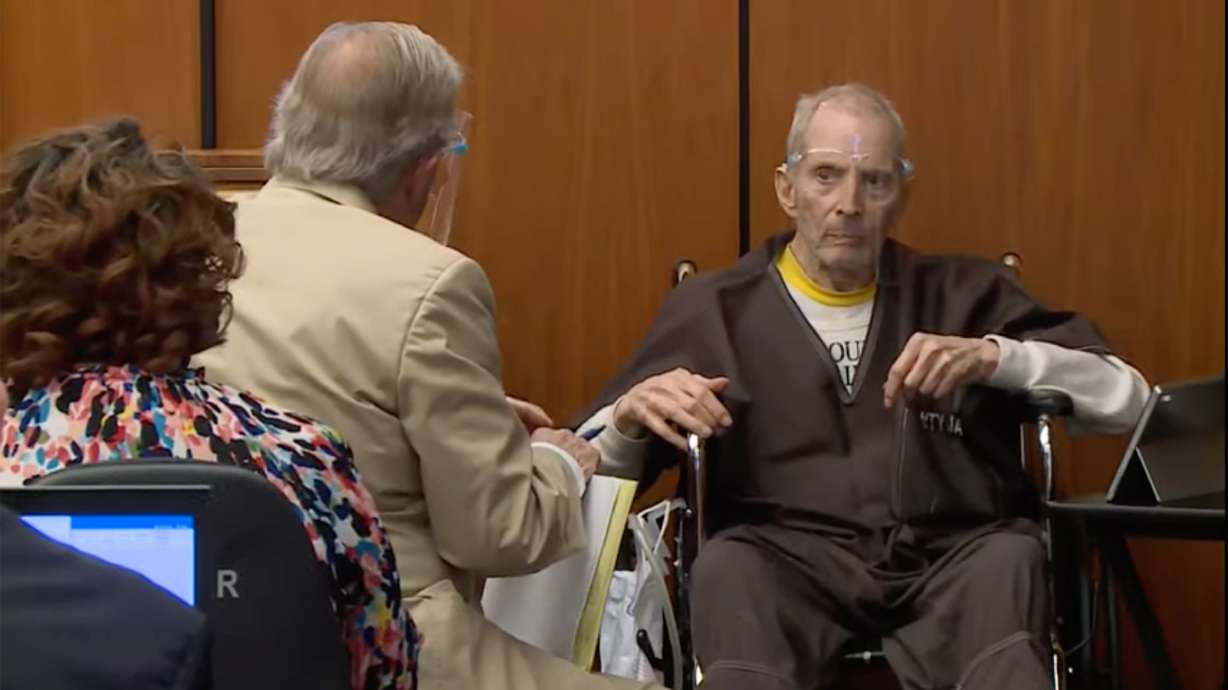 In this still image taken from the Law & Crime Network court video, real estate heir Robert Durst, right, describes what ailments he has to defense attorney Dick Deguerin during his murder trial on Monday in Los Angeles County Superior Court in Inglewood, Calif.