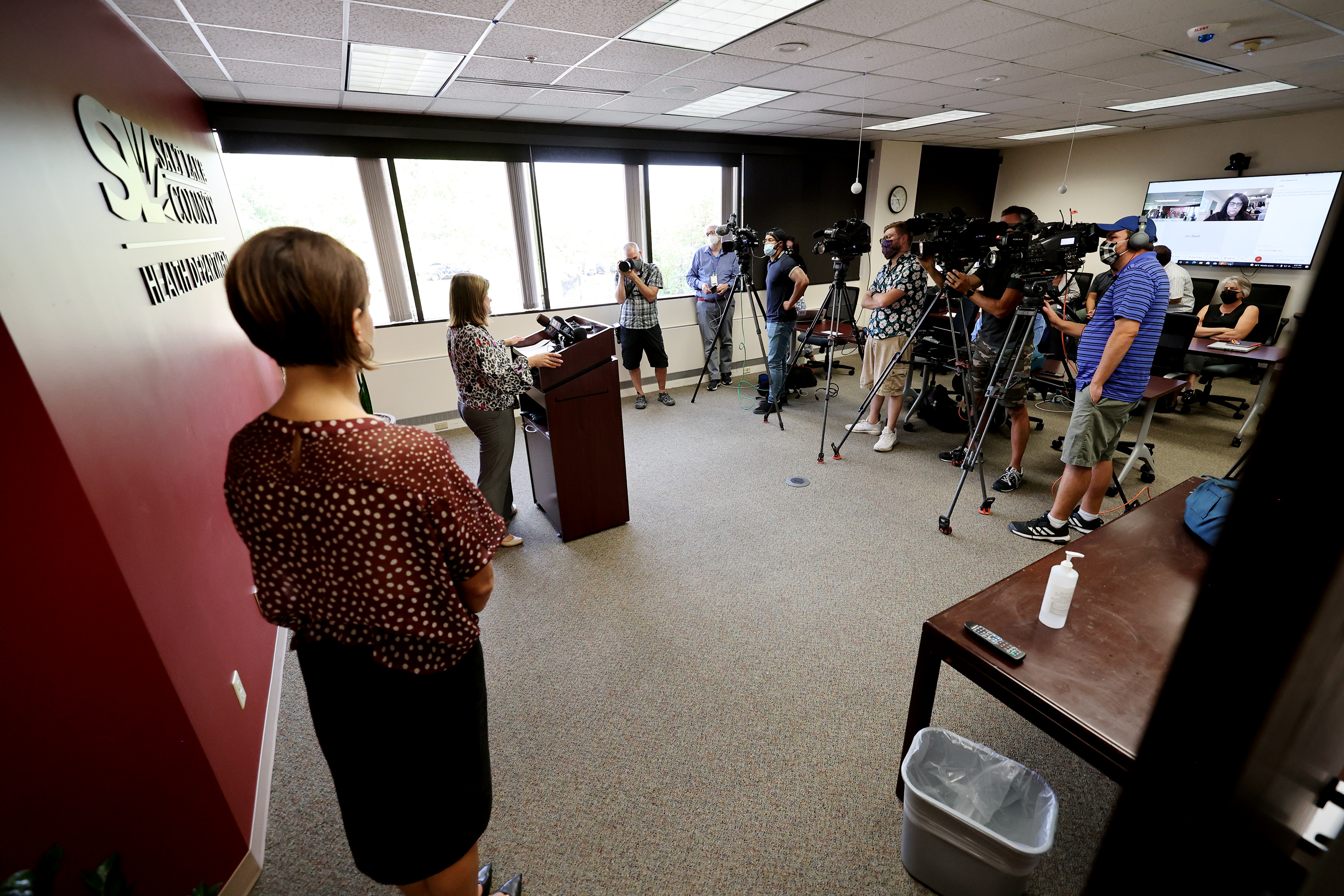 Dr. Angela Dunn, executive director of Salt Lake County Health Department, left, listens as Salt Lake County Mayor Jenny Wilson discusses schoolchildren and masks at the Salt Lake County Government Center in Salt Lake City on Tuesday. Children in the county under the age of 12 will be required to wear masks at school under an “order of restraint” to be issued by Dunn.