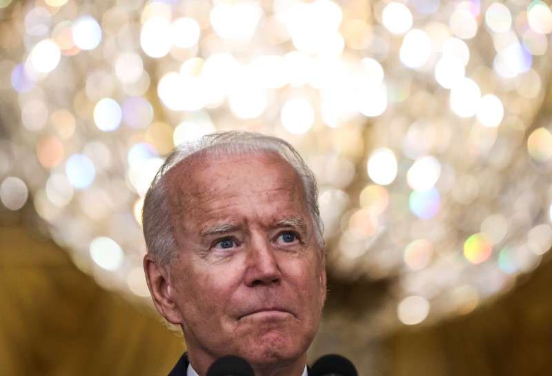 U.S. President Joe Biden takes questions as he discusses the U.S. Senate's passage of the $1 trillion bipartisan infrastructure bill, in the East Room at the White House in Washington, U.S., on Tuesday.