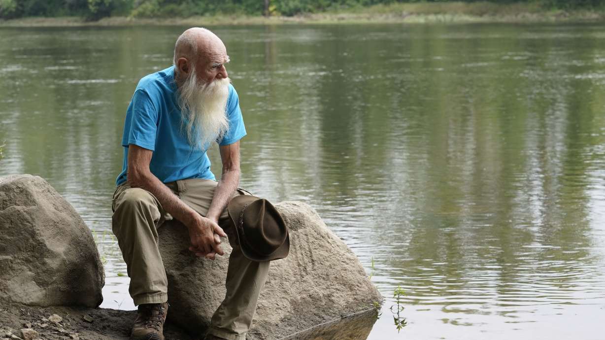 David Lidstone, 81, near the Merrimack River, Tuesday in Boscawen, N.H. Known to locals as "River Dave," he had been living in a cabin in the woods for nearly three decades. The cabin burned down, and he says he doesn't think he can return to his lifestyle.
