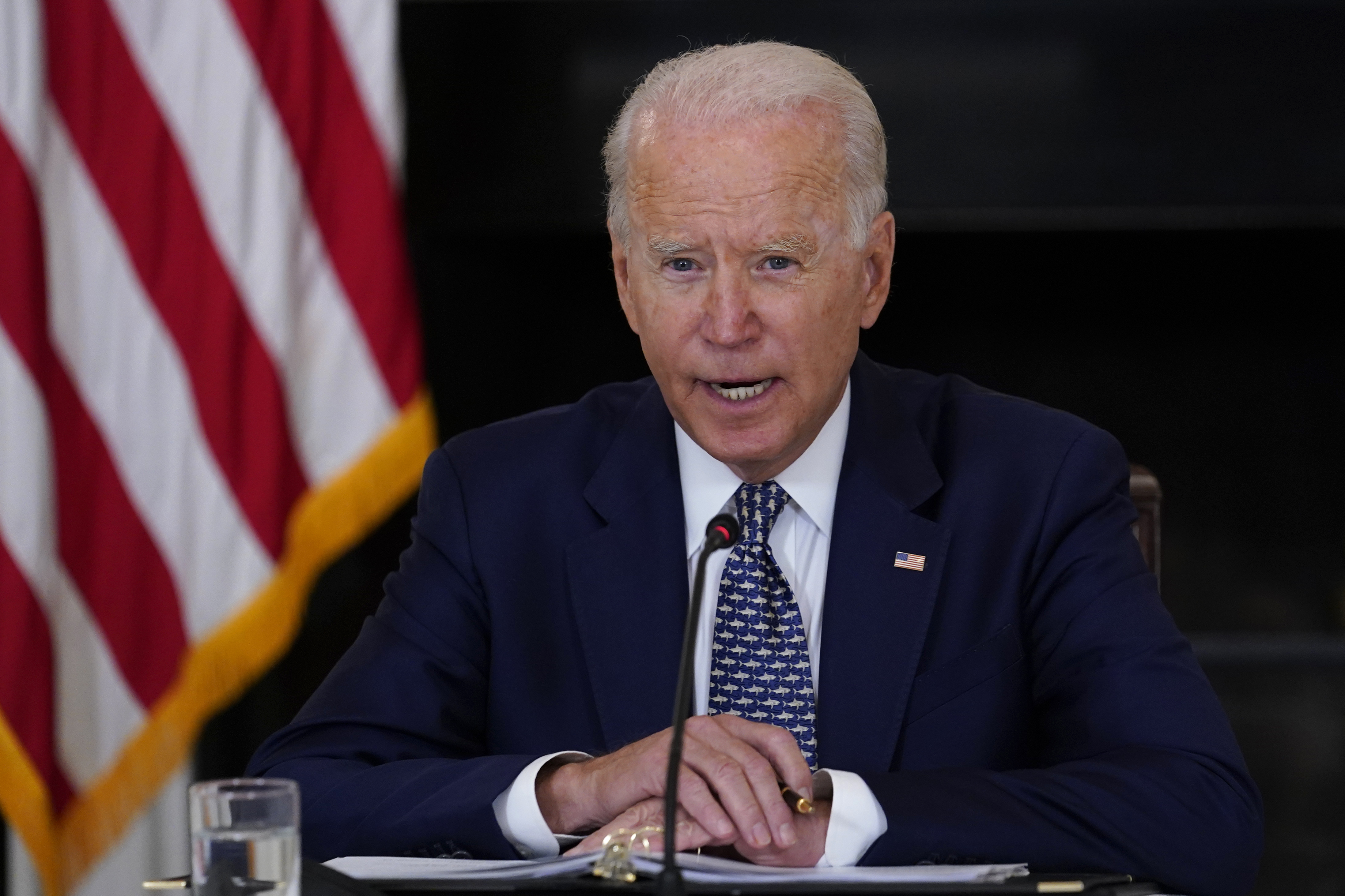 President Joe Biden speaks as he receives a briefing in the State Dining Room of the White House in Washington, Tuesday, on how the COVID-19 pandemic is impacting hurricane preparedness.