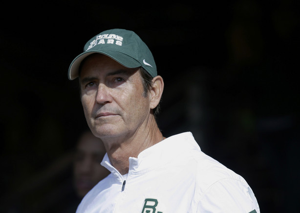In this Dec. 5, 2015, file photo, Baylor coach Art Briles stands in the tunnel before the team's NCAA college football game against Texas in Waco, Texas. The NCAA infractions committee said Wednesday, Aug. 11, 2021, that its years-long investigation into the Baylor sexual assault scandal would result in four years probation and other sanctions, though the “unacceptable” behavior at the heart of the case did not violate NCAA rules.
