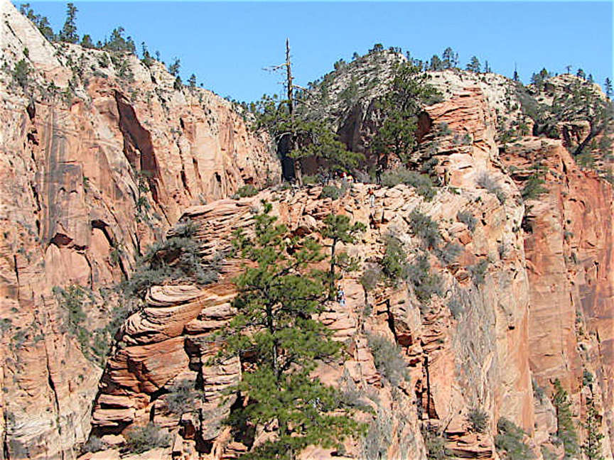 Hikers on the fin of Angels Landing on March 30, 2009. Hikers may need a reservation to hike the trail beginning in 2022.