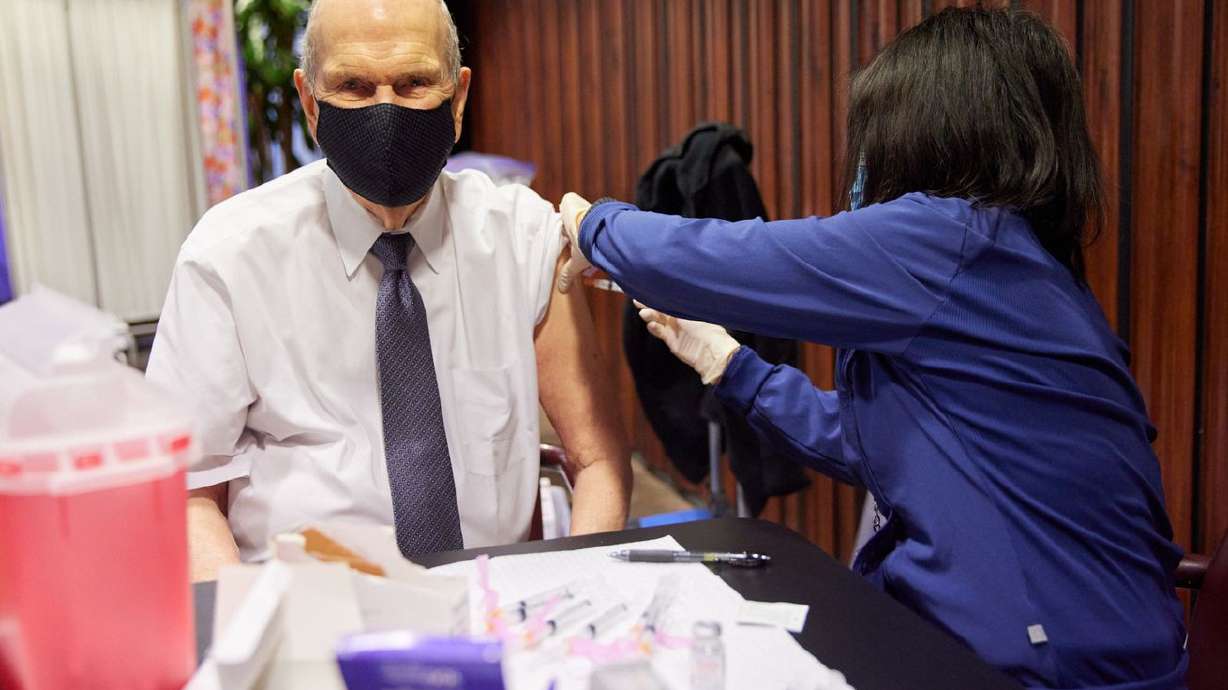 President Russell M. Nelson receives the first dose of the COVID-19 vaccine on Jan. 19 in Salt Lake City. On Thursday, the church's First Presidency again urged vaccination, saying vaccines are 'safe and effective.' The also encouraged the renewed use of masks in public meetings.