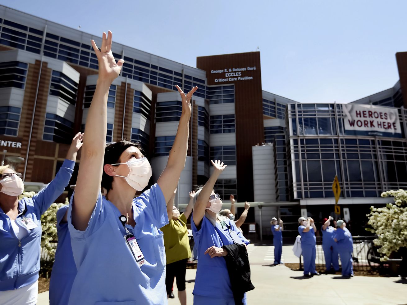 Nikole Ihler waves as Hill Air Force Base’s 388th Fighter Wing fly in formation over the hospital in Salt Lake City on Thursday, April 30, 2020. An April study of nearly 28,000 University of Utah Health system clinical and nonclinical faculty, staff and trainees found that 20% of respondents, 1 in 5, are considering leaving their professions.