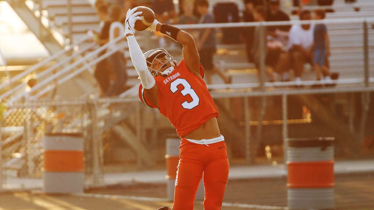 Skyridge's Smith Snowden (3) catches a touchdown against Fremont in Lehi on Thursday, Aug. 12, 2021.