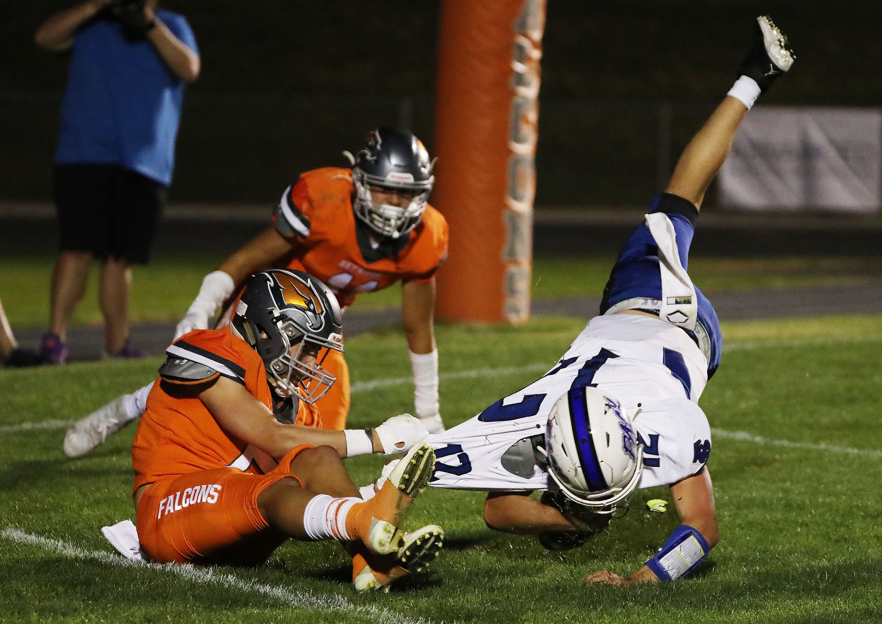 Skyridge's Collin Sheffield (5) sacks Fremont QB Cannon Koford and recovers a fumble for a touchdown in Lehi on Thursday, Aug. 12, 2021.