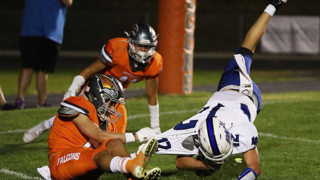 Skyridge's Collin Sheffield (5) sacks Fremont QB Cannon Koford and recovers a fumble for a touchdown in Lehi on Thursday, Aug. 12, 2021.