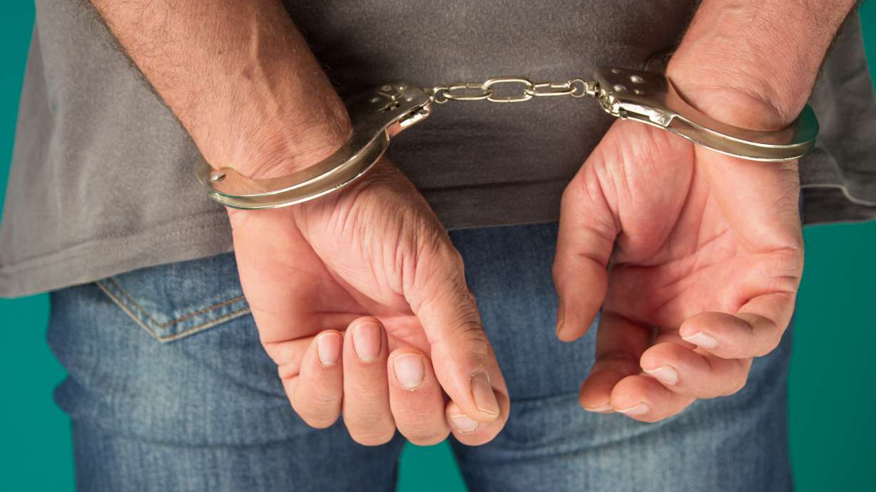 A man working as security for a Salt Lake business has been arrested and accused of shooting another man whom he said had been messing with him for two years.