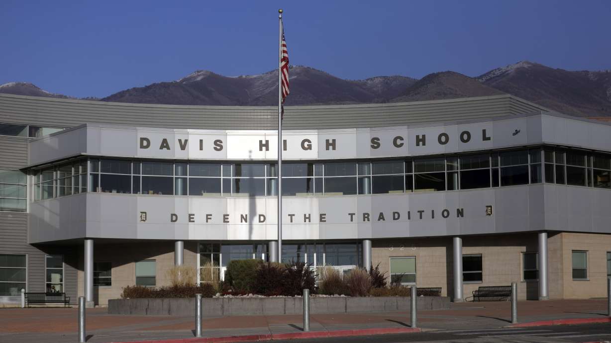 A former Davis High School secretary has been charged with spending more than $80,000 in school funds on herself for items such as new flooring for her home.