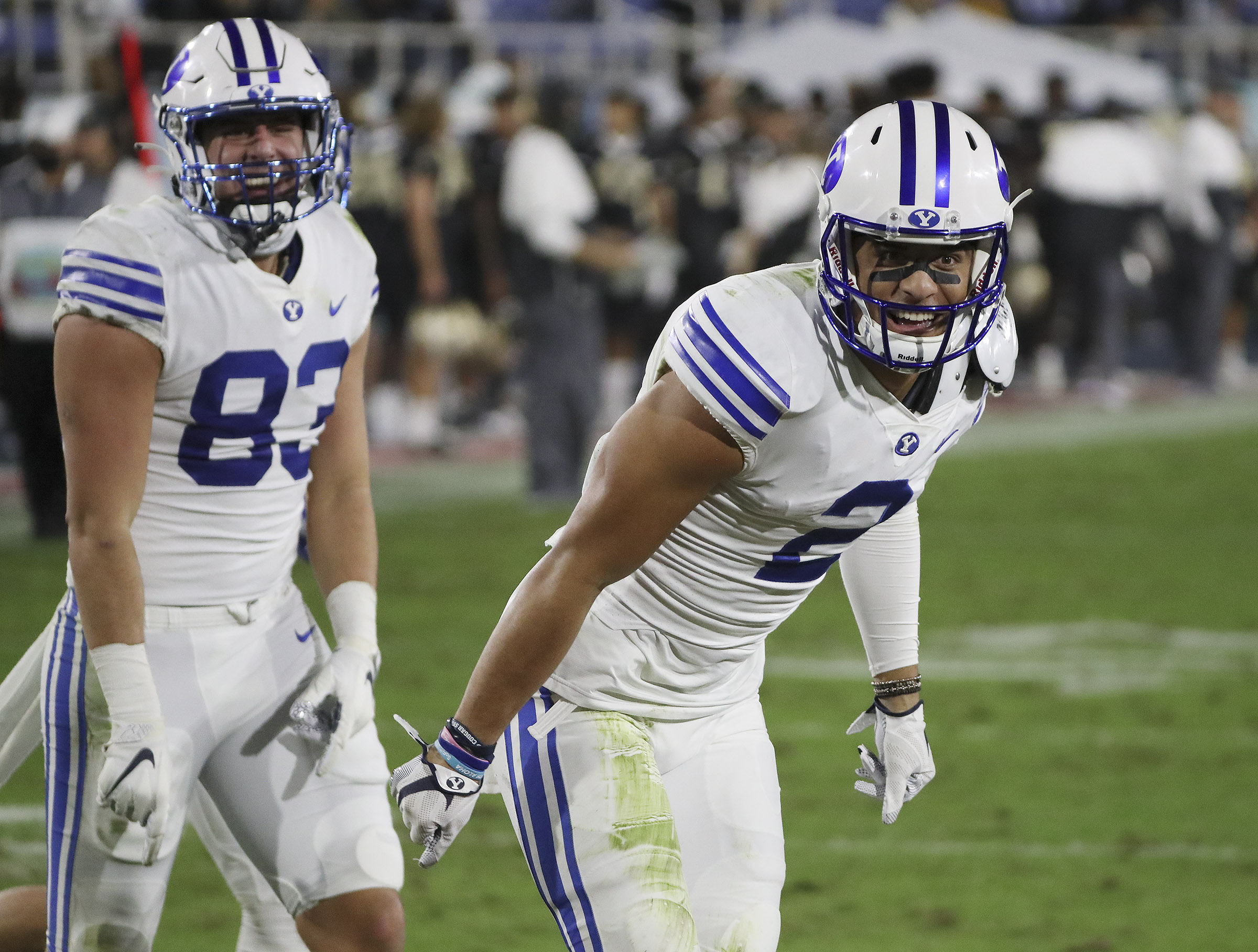 BYU wide receiver Neil Pau'u (2) celebrates his  touchdown  against the UCF Knights with BYU tight end Isaac Rex during the Boca Raton Bowl in Boca Raton, Fla., on Dec. 22, 2020.
