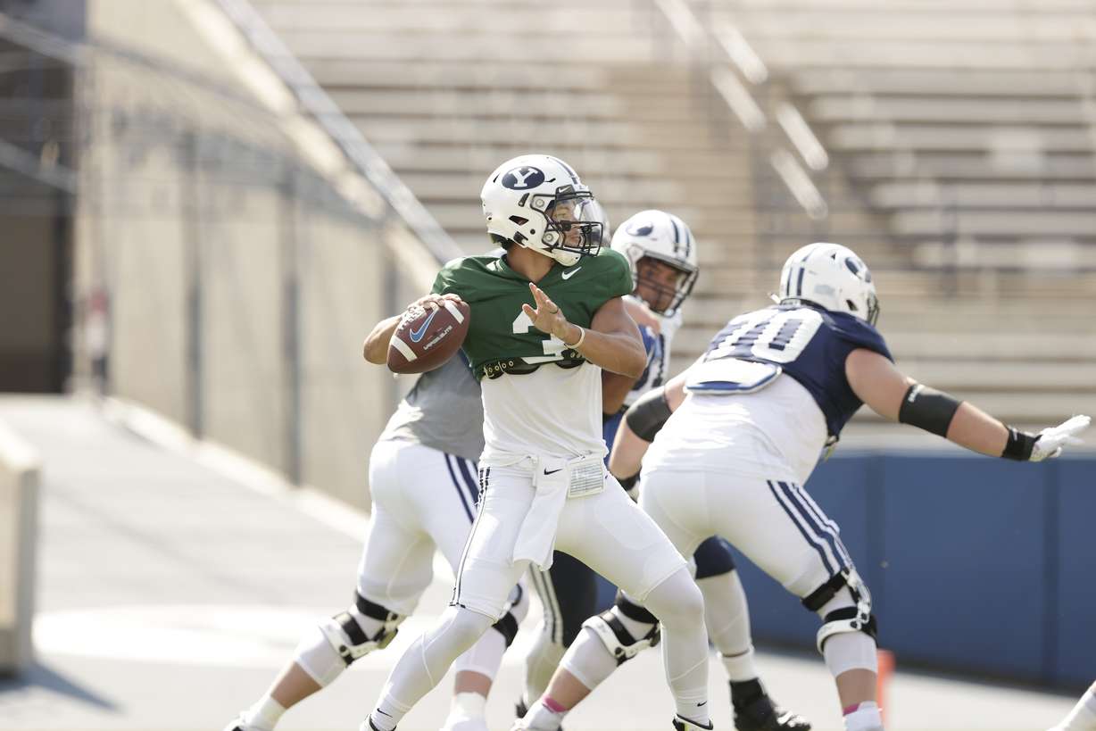 BYU quarterback Jaren Hall looks to pass during a scrimmage Saturday, Aug. 14, 2021 at LaVell Edwards Stadium.