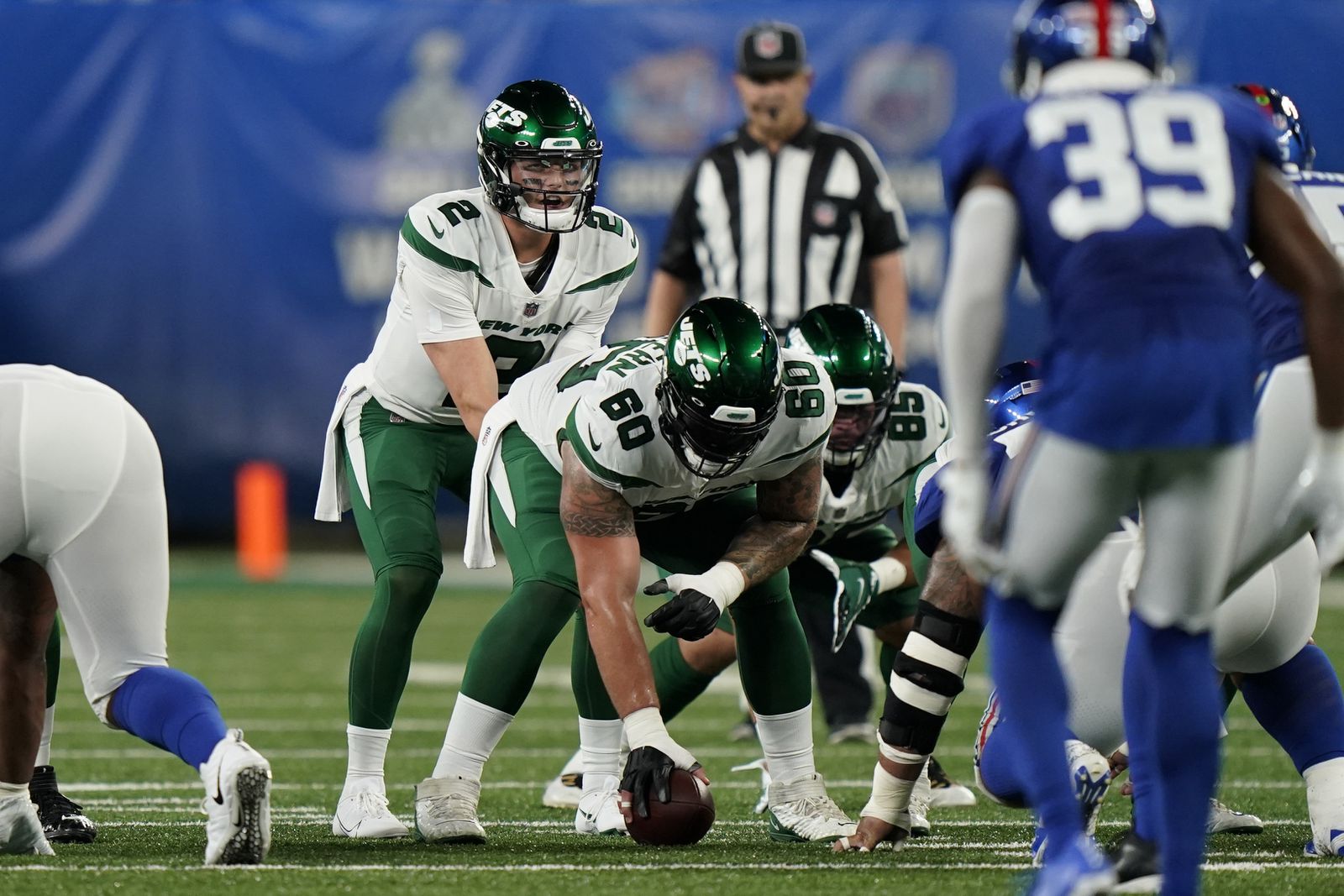 New York Jets quarterback Zach Wilson (2) calls a play before the snap during the first half of the team’s NFL preseason football game against the New York Giants, Saturday, Aug. 14, 2021, in East Rutherford, N.J.