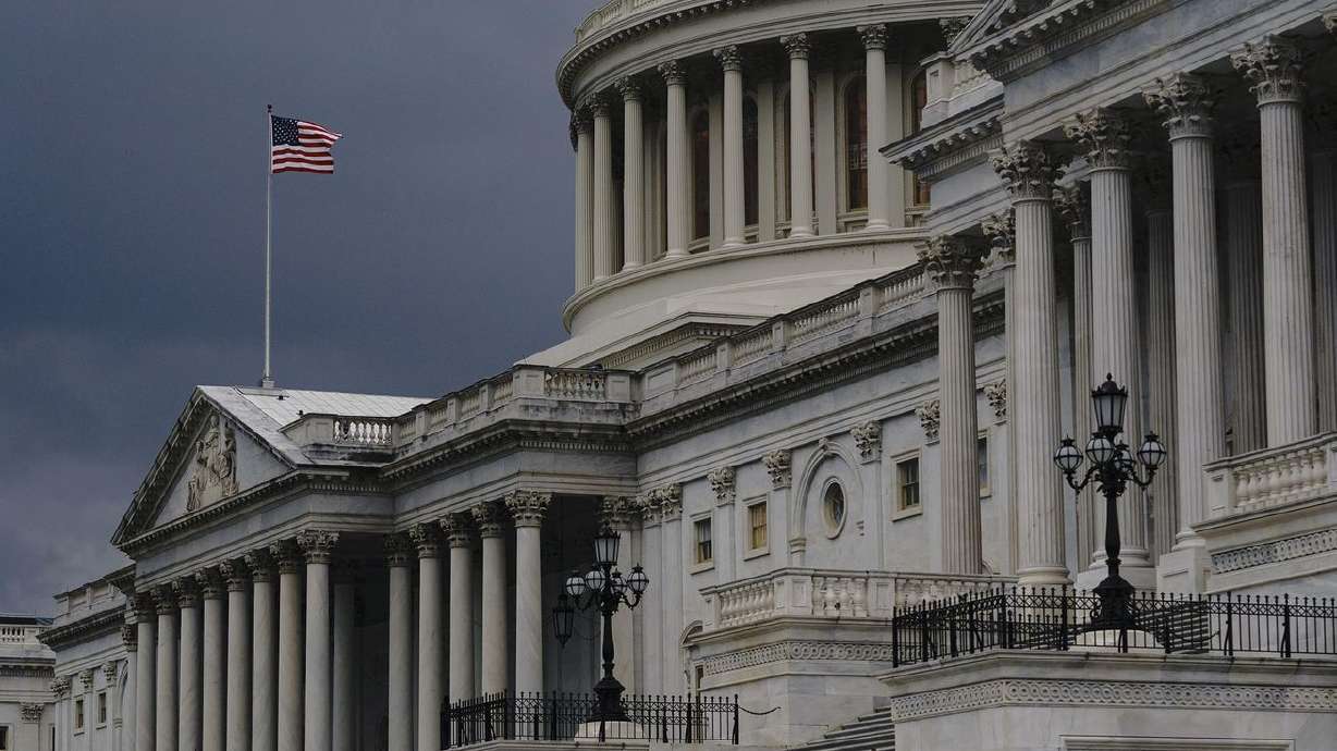 Dark clouds and heavy rain sweep over the U.S. Capitol
in Washington on Aug. 3, 2020. With the release of 2020 census data
on Thursday, lawmakers across the nation are beginning
redistricting processes to help decide who represents Americans —
all the way from Congress to state legislatures to school boards.