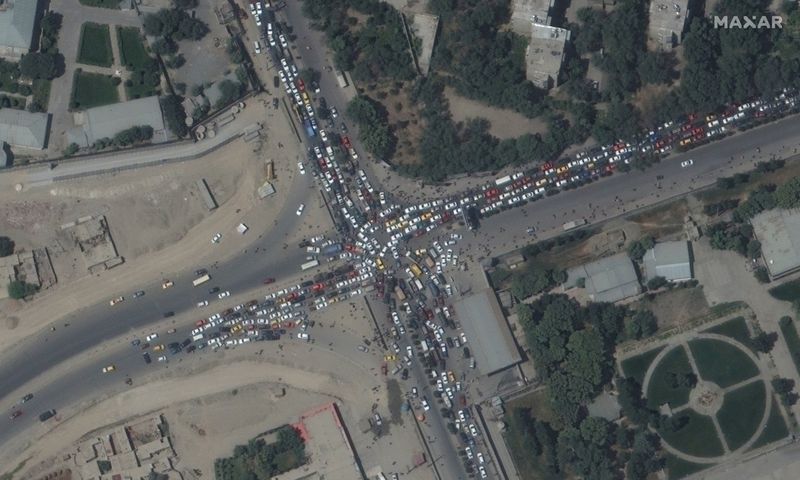 Traffic jam and crowds are seen near Kabul's airport in Afghanistan Monday.