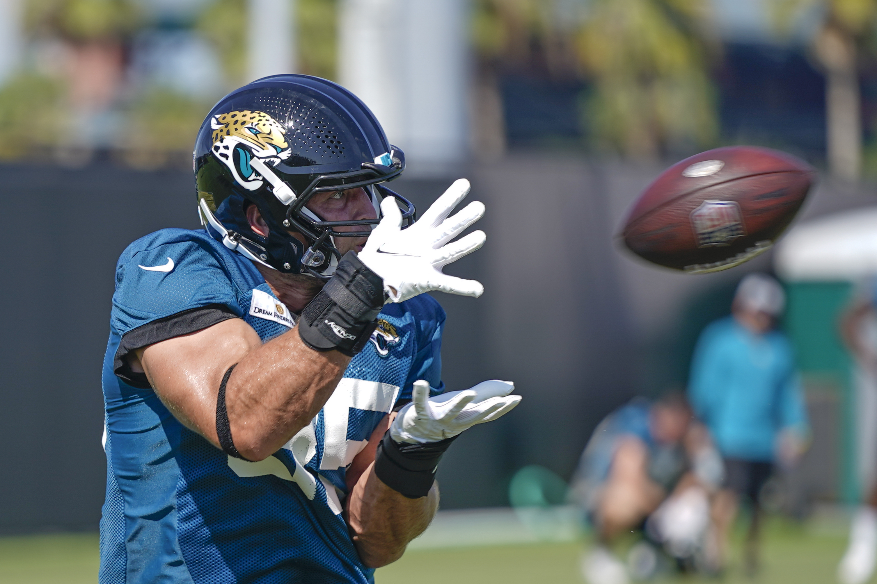 Jacksonville Jaguars tight end Tim Tebow makes a reception during a drill at NFL football practice, Saturday, July 31, 2021, in Jacksonville, Fla.
