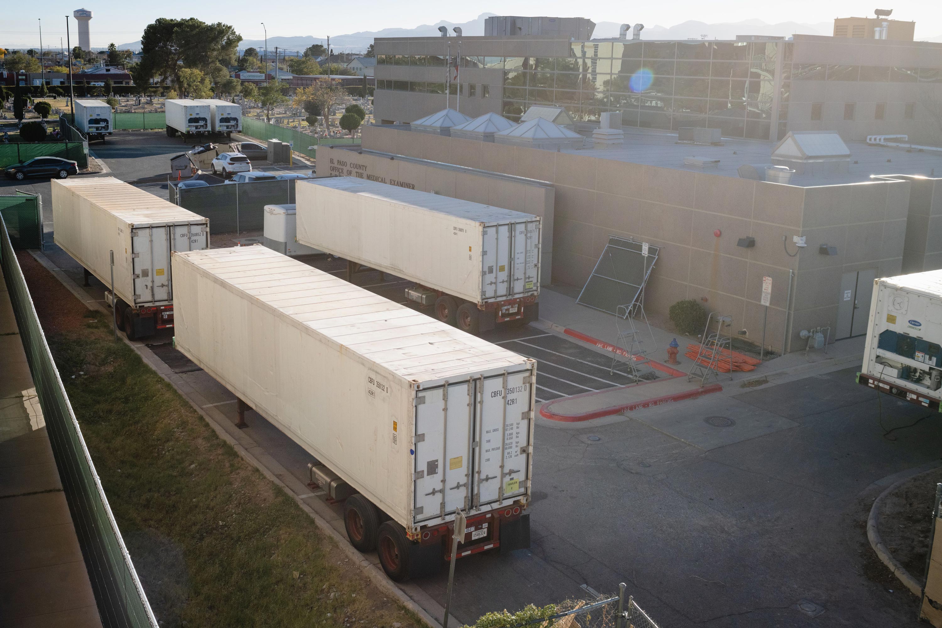 Refrigerated trailers serving as makeshift morgues are pictured outside of the El Paso County Medical Examiner's office in El Paso, Texas, on Nov. 16, 2020. Five mortuary trailers have been requested by the health services department in Texas, which is seeing a surge in COVID-19 cases.