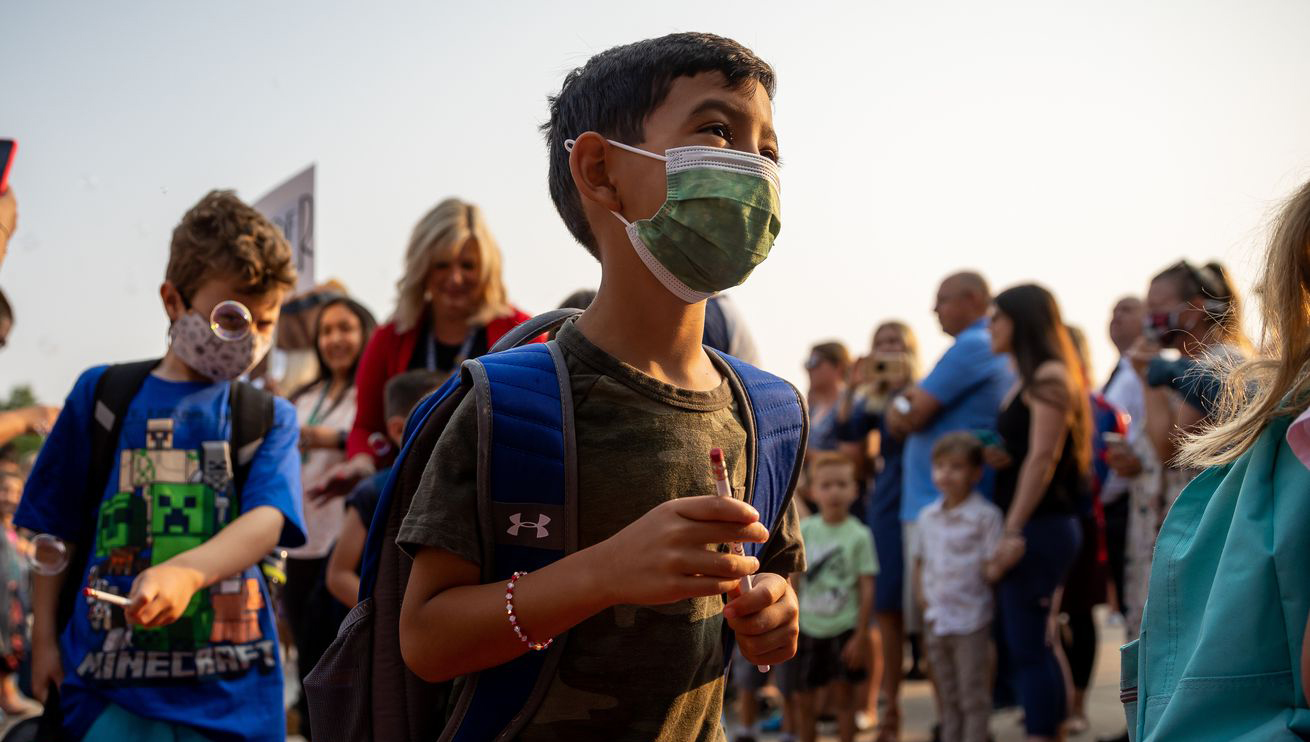 Giancarlo Gonzalez, 6, wears a mask as he and other students arrive for the first day of school in Sandy on Monday. Salt Lake City Mayor Erin Mendenhall on Tuesday said she’s prepared to issue a school mask mandate in Salt Lake City School District — if the school district holds an emergency meeting to vote in support of a mandate.