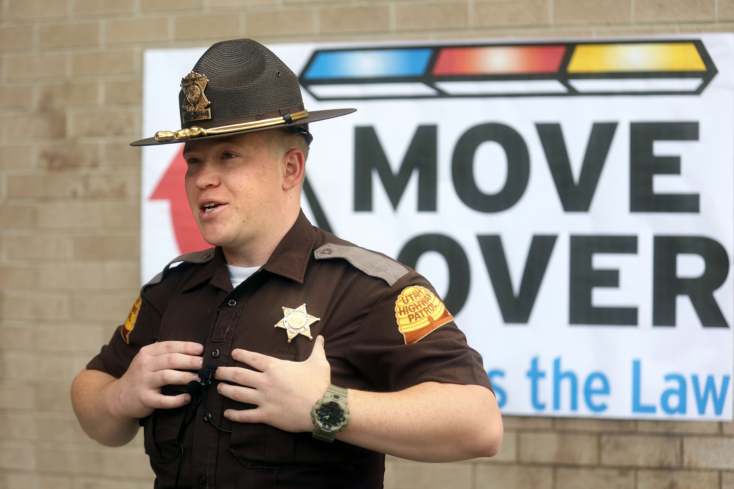 Utah Highway Patrol trooper Thomas Burnam talks about the importance of moving over to give space to emergency responders working on the side of the road during a press conference at the UHP headquarters in Taylorsville on Tuesday. Burnam says he has been hit two times.