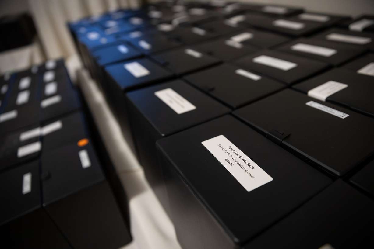 Boxes containing unclaimed cremated remains are pictured during a service honoring those individuals at Neil O’Donnell Funeral Home in Salt Lake City on Tuesday.