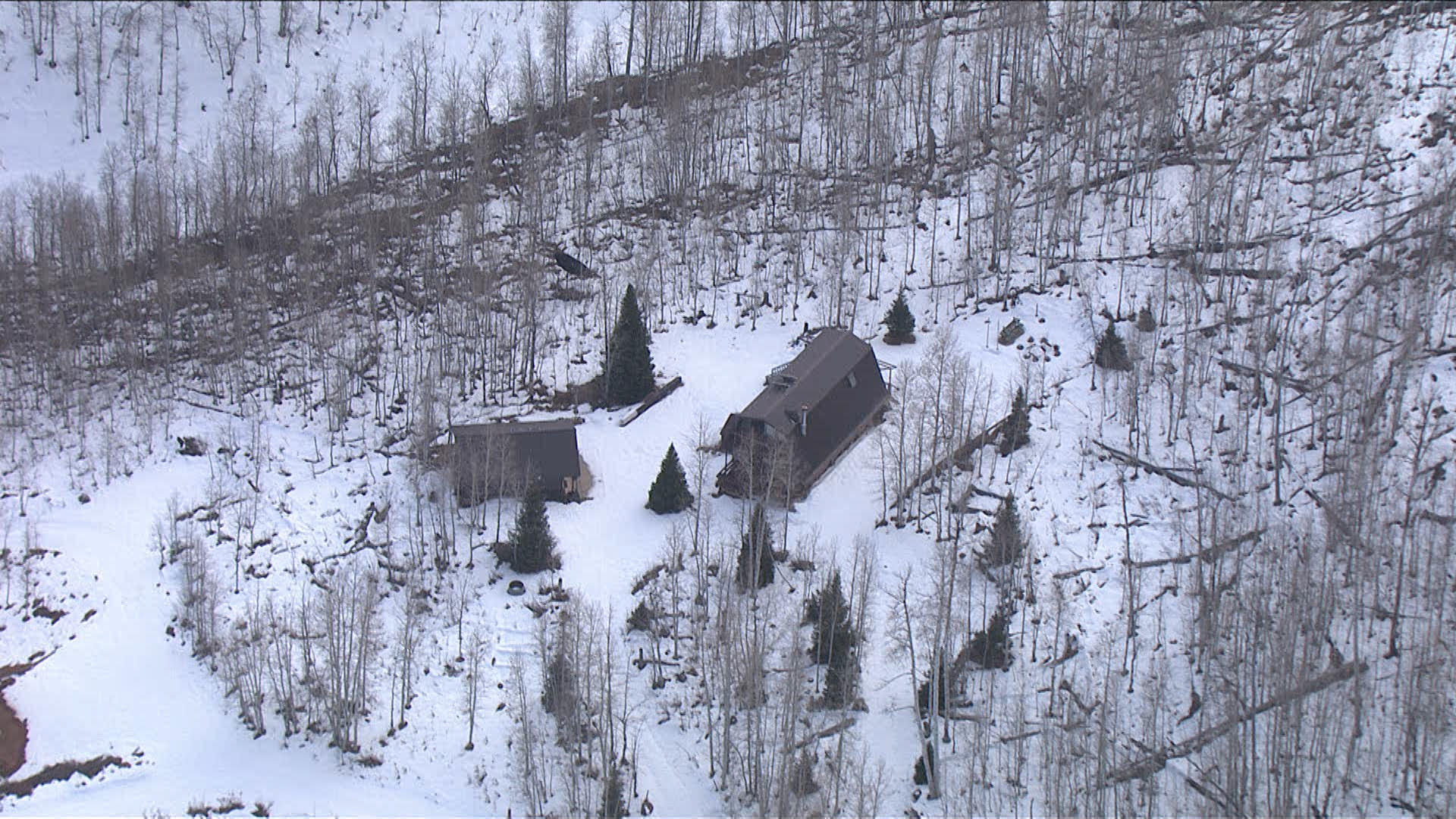 This Dec. 9, 2020, image from KSL TV’s Chopper 5 shows the Weber County cabin that was owned by the family of Douglas Lovell from 1979 to 2014. Police were not able to search the cabin property until the summer of 2021.
