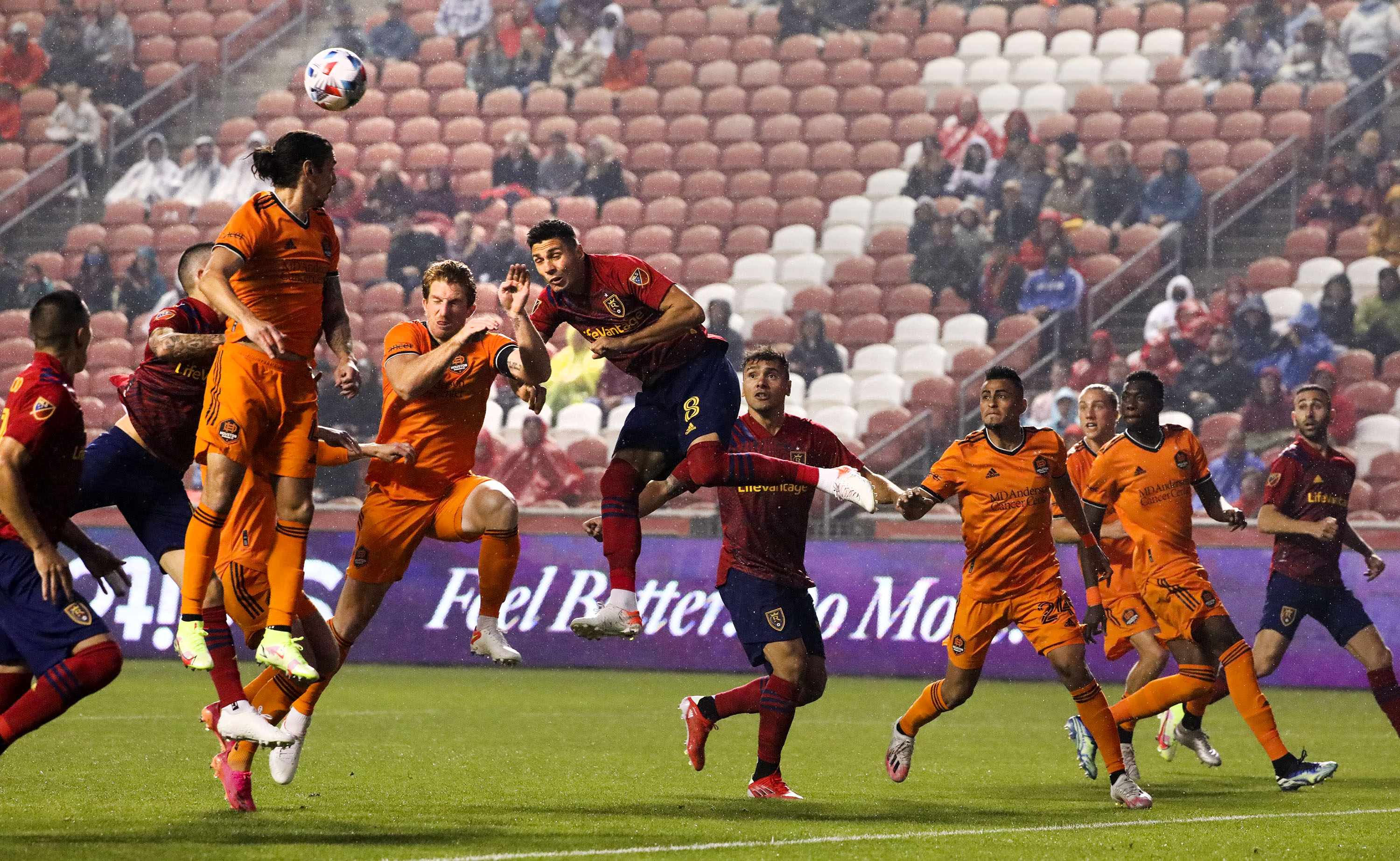 Houston's Tim Parker and Real Salt Lake's Damir Kreilach compete for the ball at Rio Tinto Stadium in Sandy on Wednesday, Aug. 18, 2021.