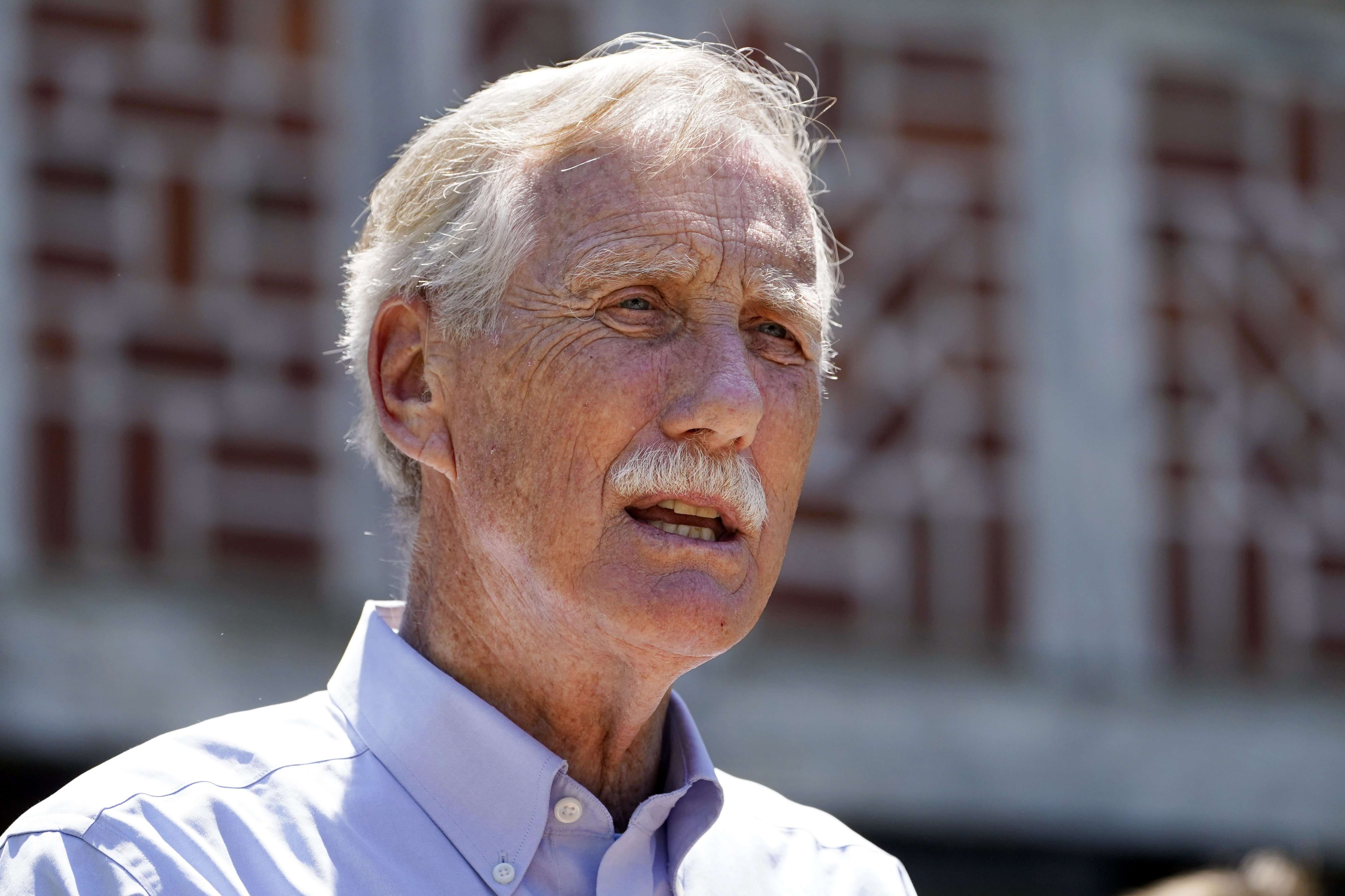Sen. Angus King, I-Maine, speaks at Acadia National Park in Winter Harbor, Maine June 18. King tested positive for COVID-19 on Thursday.