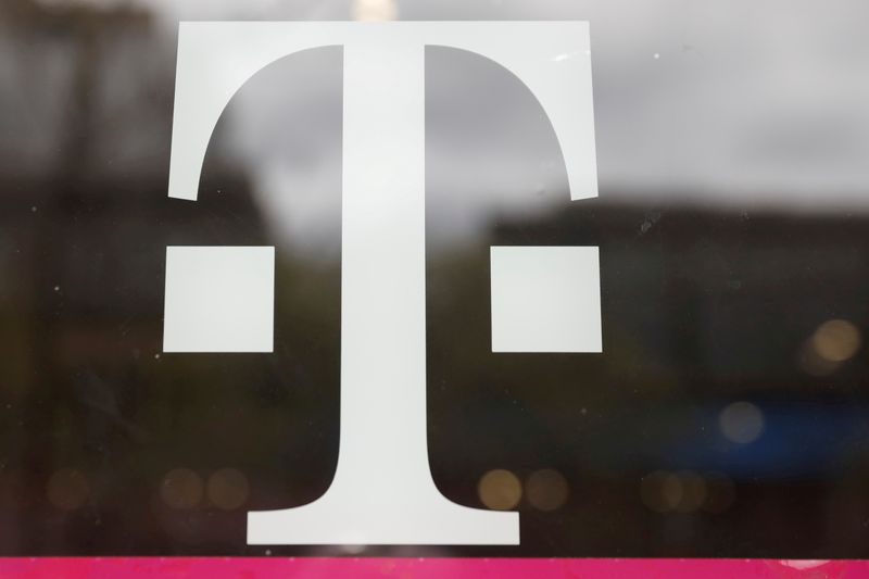 A T-Mobile logo is seen on a store in Manhattan, New York, on April 30, 2018. T-Mobile U.S. said on Friday an ongoing investigation into a data breach revealed that hackers accessed personal information of more than 53 million customers.