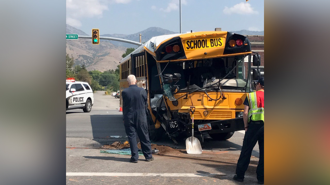 High school students walked away largely unscathed Friday after a school bus collided with the cabin of a semitrailer in Smithfield.