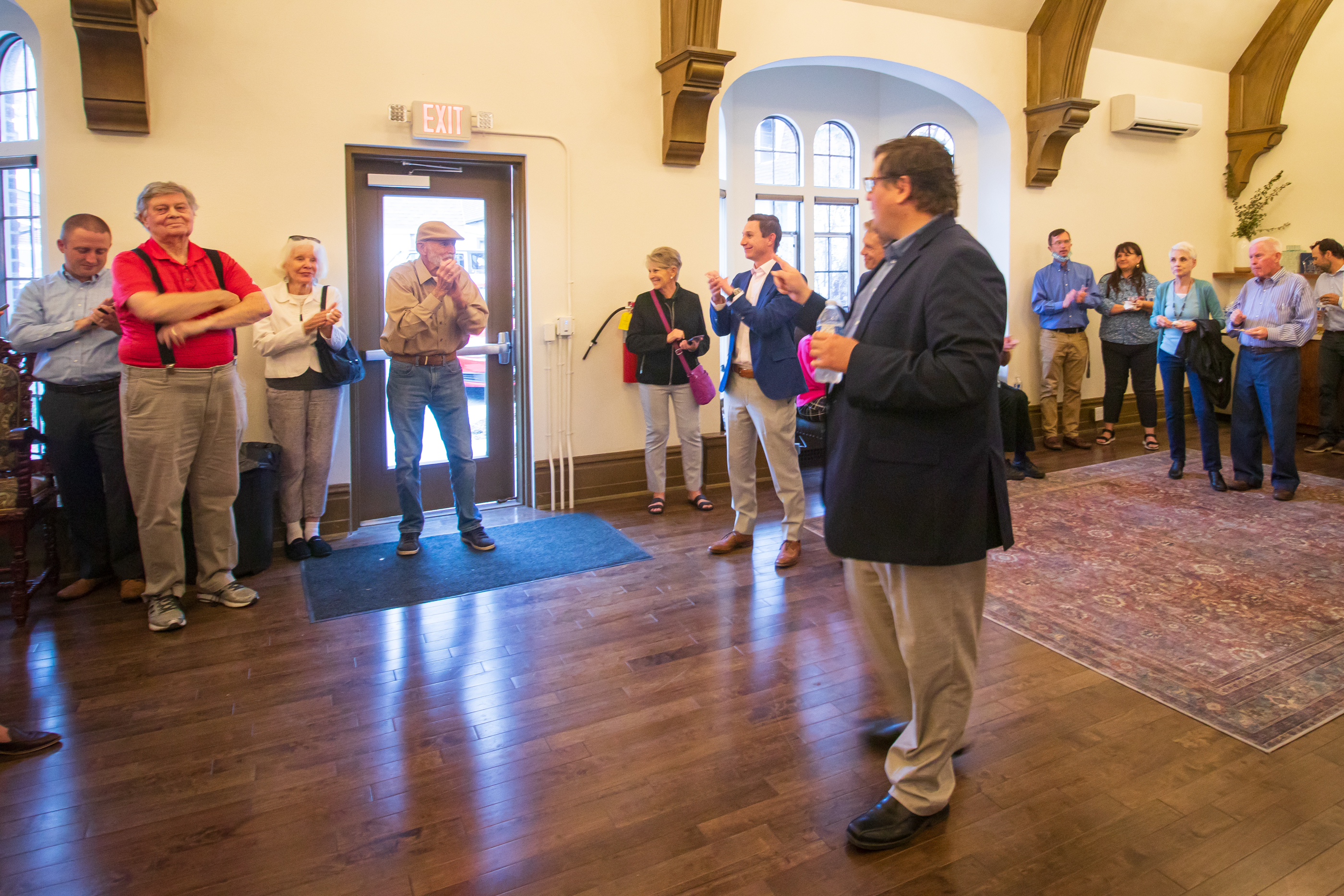 Stevens Nelson, of Provo, thanks David Amott, the executive director of the nonprofit organization Preservation Utah, for helping save Amanda Knight Hall during an open house on Thursday.