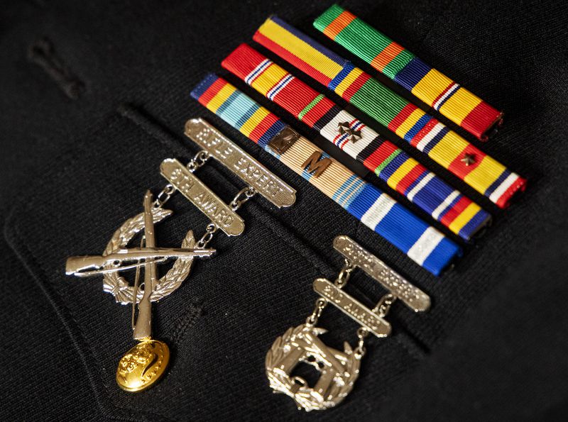 Medals and ribbons belonging to Jeremy Ruppe, a Marine
who served with the 4th Light Armored Reconnaissance Battalion in Afghanistan, are pictured at his home in Lindon on Friday.
