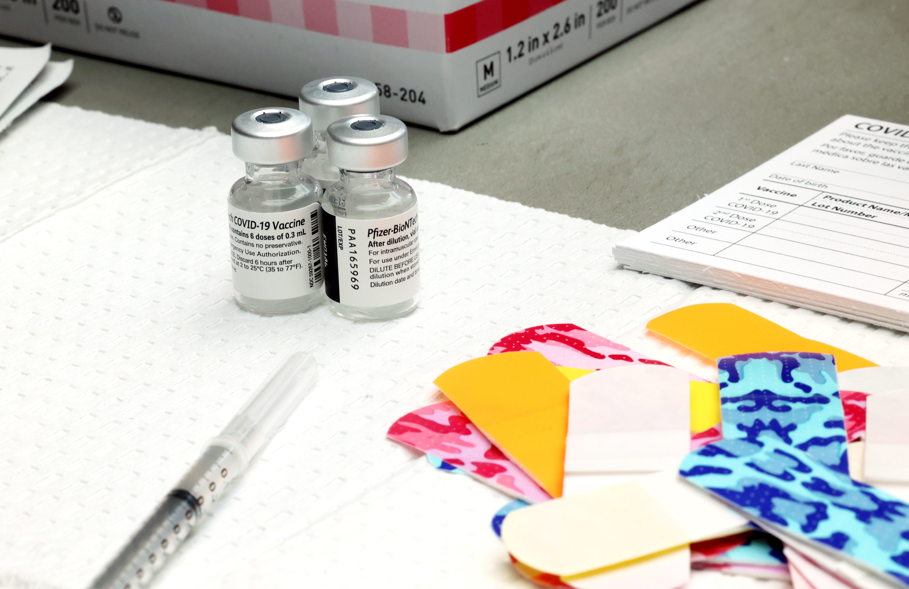 Pfizer-BioNTech COVID-19 vaccine vials sit on a table at a vaccination clinic at the Shepherd Union Atrium at Weber State University in Ogden. Studies show up to 30% of adults have a fear of needles and that fear is one reason for COVID-19 vaccine hesitancy in many people.