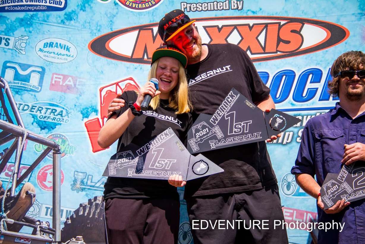 14-year-old Katelynn Boren and her father Kevin Boren compete in a rock climbing competition.