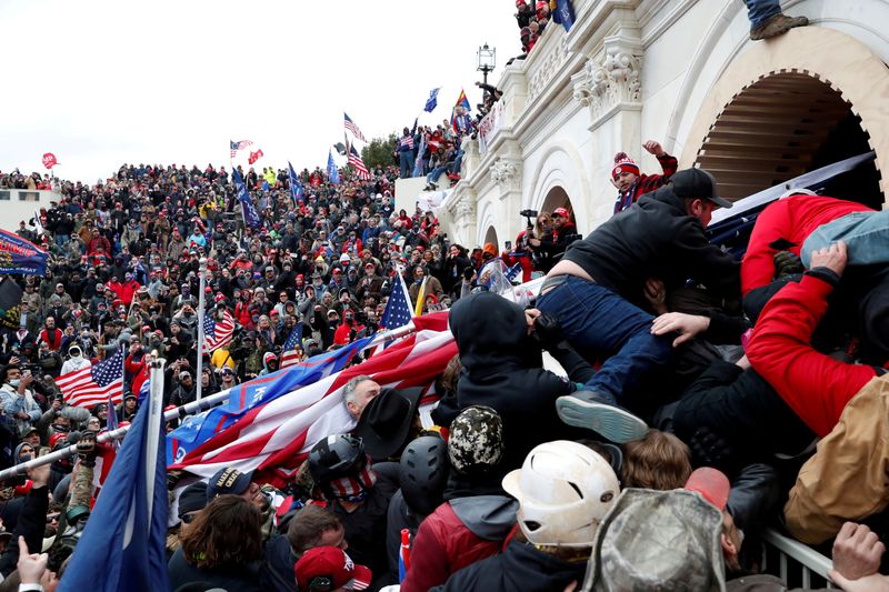 Pro-Trump protesters storm into the U.S. Capitol during clashes with police, during a rally to contest the certification of the 2020 U.S. presidential election results by Congress, in Washington, D.C., on Jan. 6, 2021.
