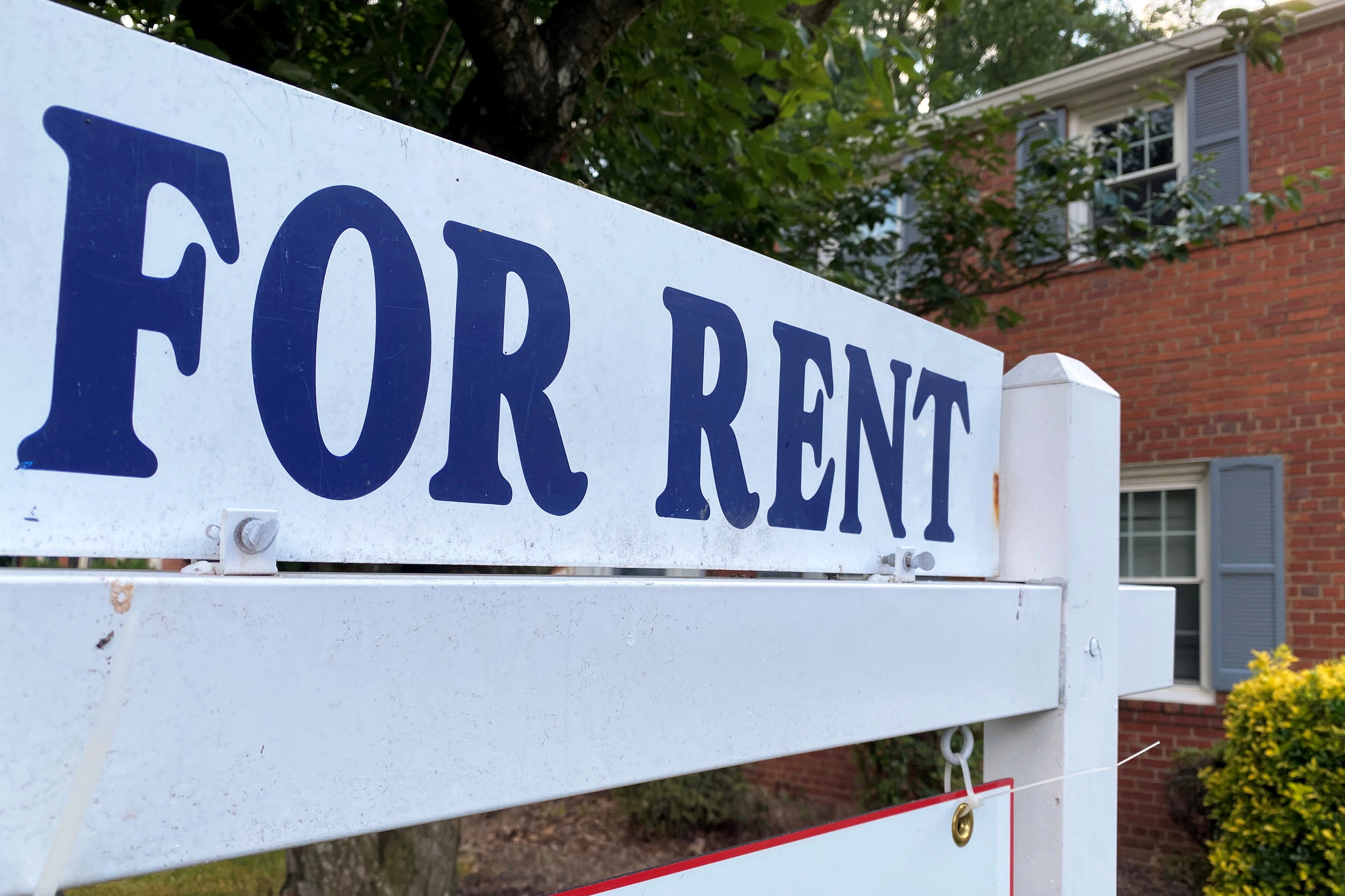 A "For Rent" sign is placed in front of a home in Arlington, Virginia, on June 8, 2021. On Monday, President Joe Biden's administration asked the U.S. Supreme Court to leave in place a COVID-19 pandemic-related federal ban on residential evictions