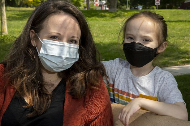 Ashley Weitz, who is among a group of parent plaintiffs who are calling into question the constitutionality of laws.
limiting schools’ capacity to safely serve students during an
ongoing pandemic, poses for photos with son Ezra, 7, in Salt Lake
City on Friday, Aug. 20, 2021.