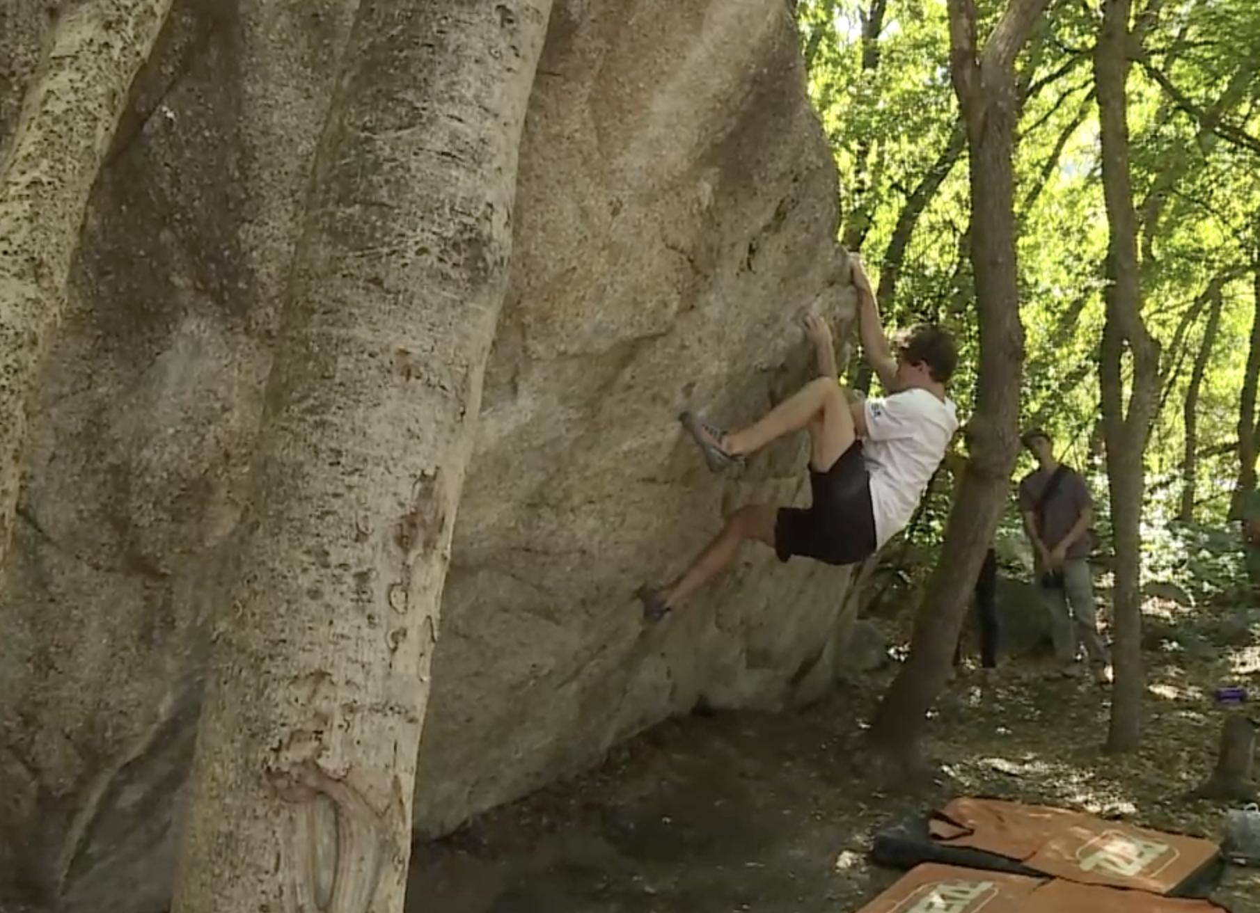 Utah climber Nathaniel Coleman climbs a boulder in Little Cottonwood Canyon on Aug. 23, 2021.