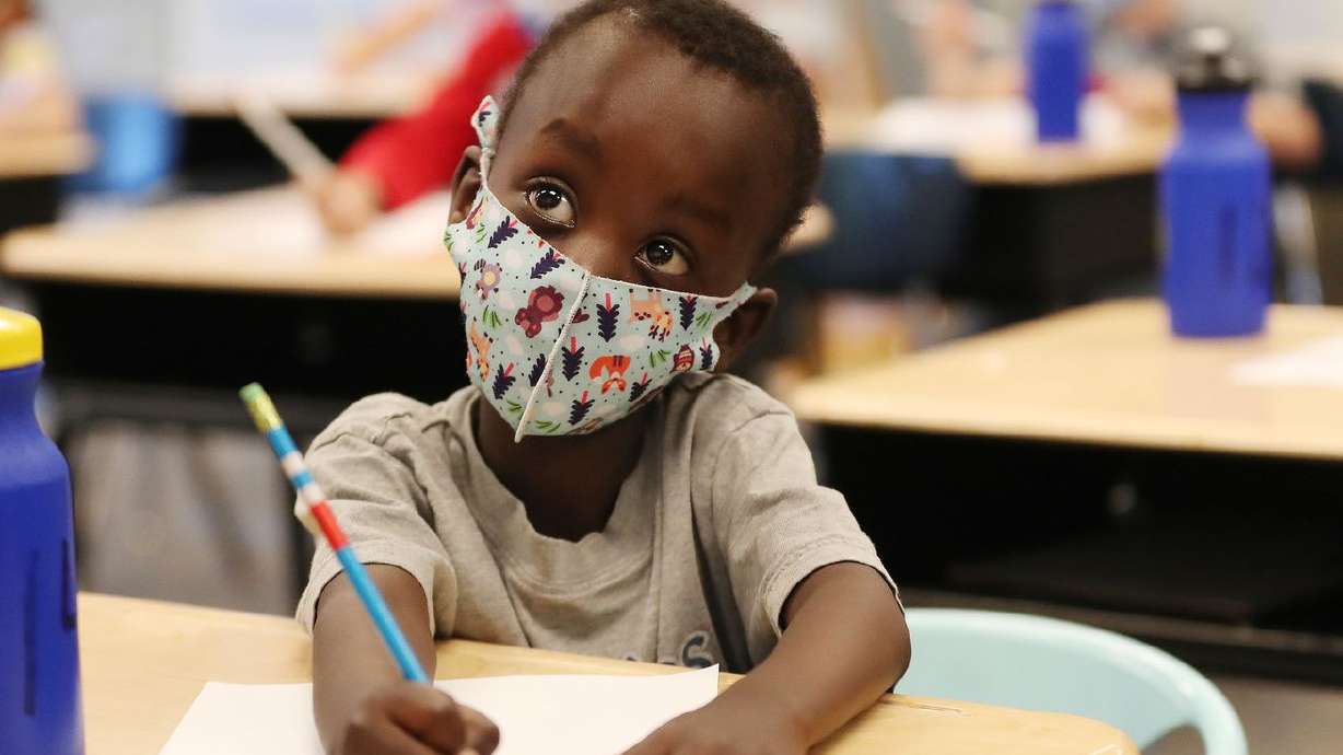 Kindergartner Isaac Nshuti wears a mask at Woodrow Wilson Elementary School in Salt Lake City on May 12.