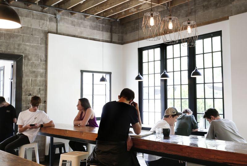 Patrons visit Publik Coffee Roasters in Salt Lake City
on Aug. 20.