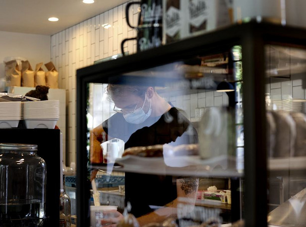 Spencer Turner works at Publik Coffee Roasters in Salt
Lake City on Aug. 20.