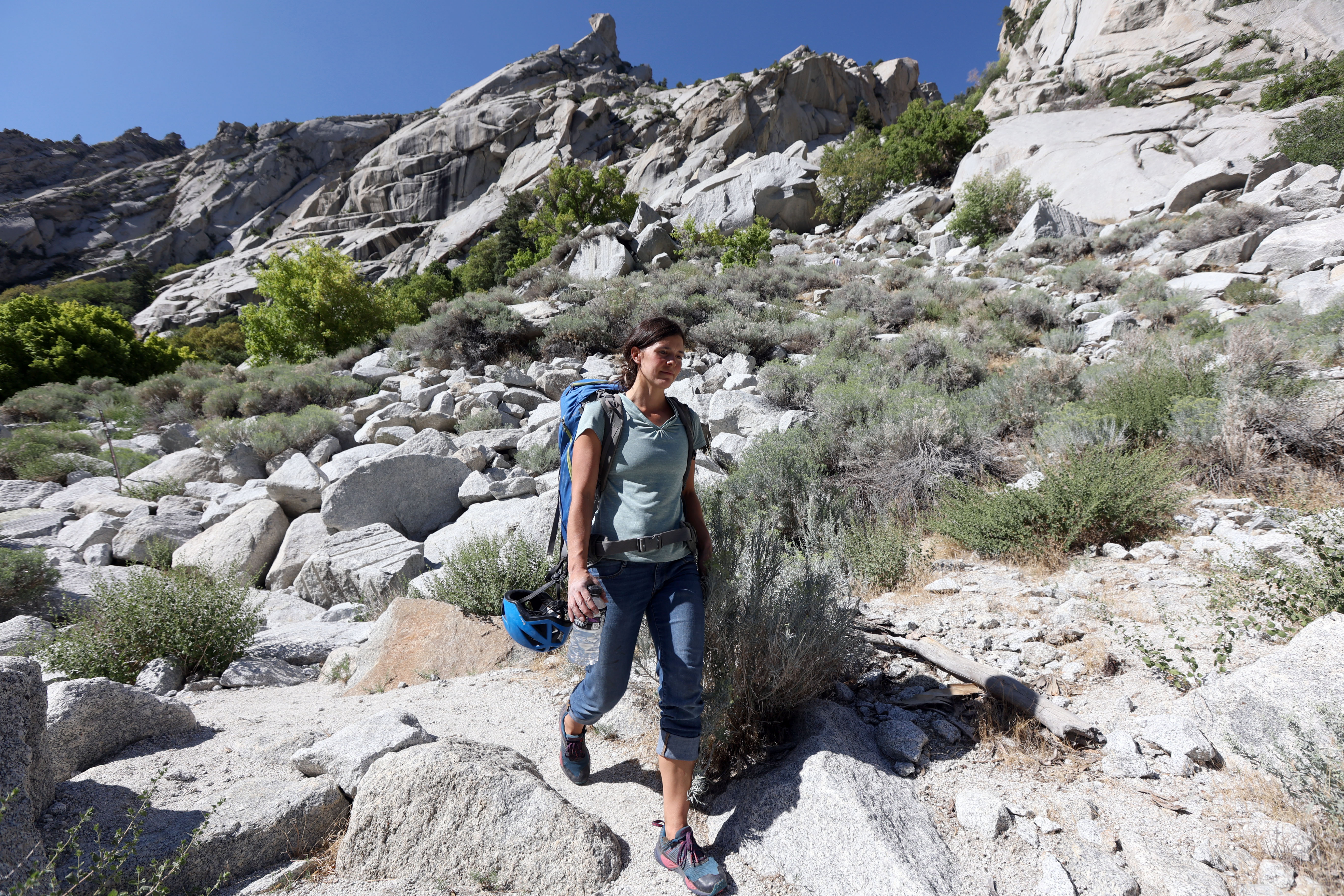Sarah Schenk hikes down to the Gate Buttress parking lot in Little Cottonwood Canyon on Aug. 23, 2021. A new online dashboard debuted Monday, offering the public and elected leaders more insight into the environment in the central Wasatch Mountains.