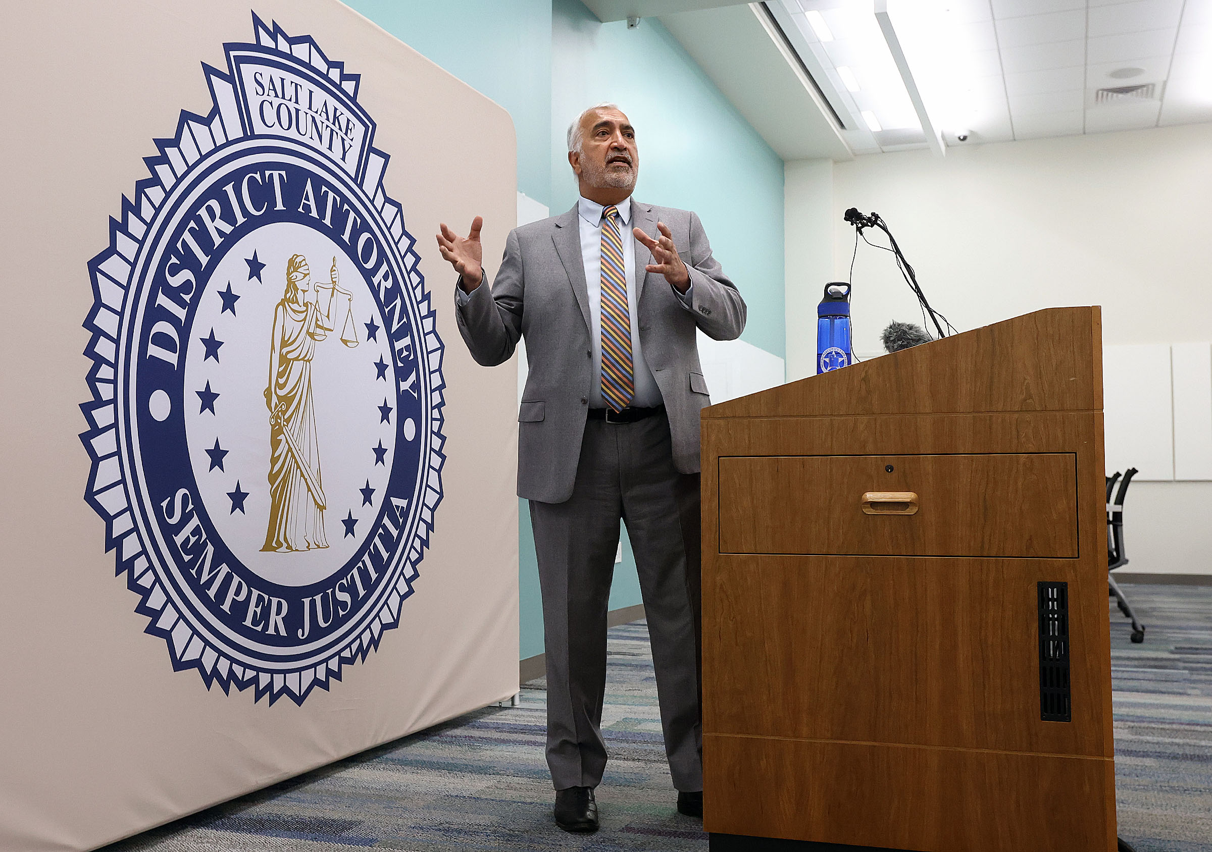 Salt Lake County District Attorney Sim Gill speaks during a press conference in Salt Lake City on Aug. 24. Gill announced Friday that a sheriff's deputy was legally justified when he shot and killed a gunman who had just shot another deputy in the eye in April.