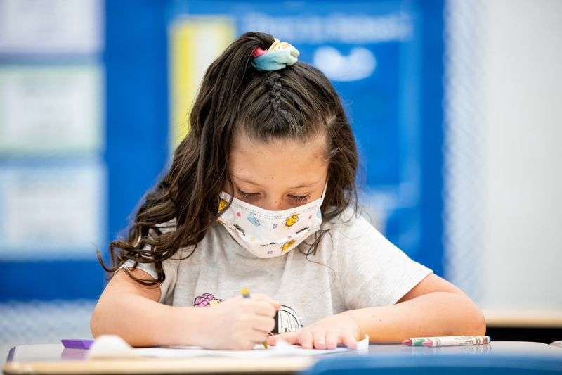 Anastazia Dall works in her first grade class at Nibley
Park School in Salt Lake City on Tuesday, Aug. 24,
2021.
