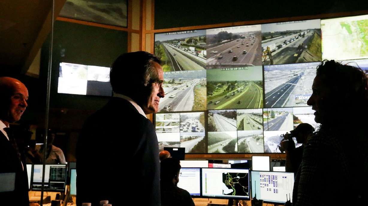 Utah Sen. Mitt Romney tours the Utah Department of
Transportation’s Traffic Operations Center in Salt Lake City on
Thursday.