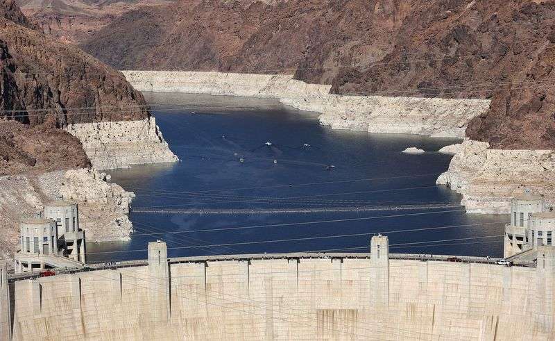 Boaters cruise on Lake Mead near the Hoover Dam on April 10. Both the Colorado and the Virgin Rivers
empty into the lake.