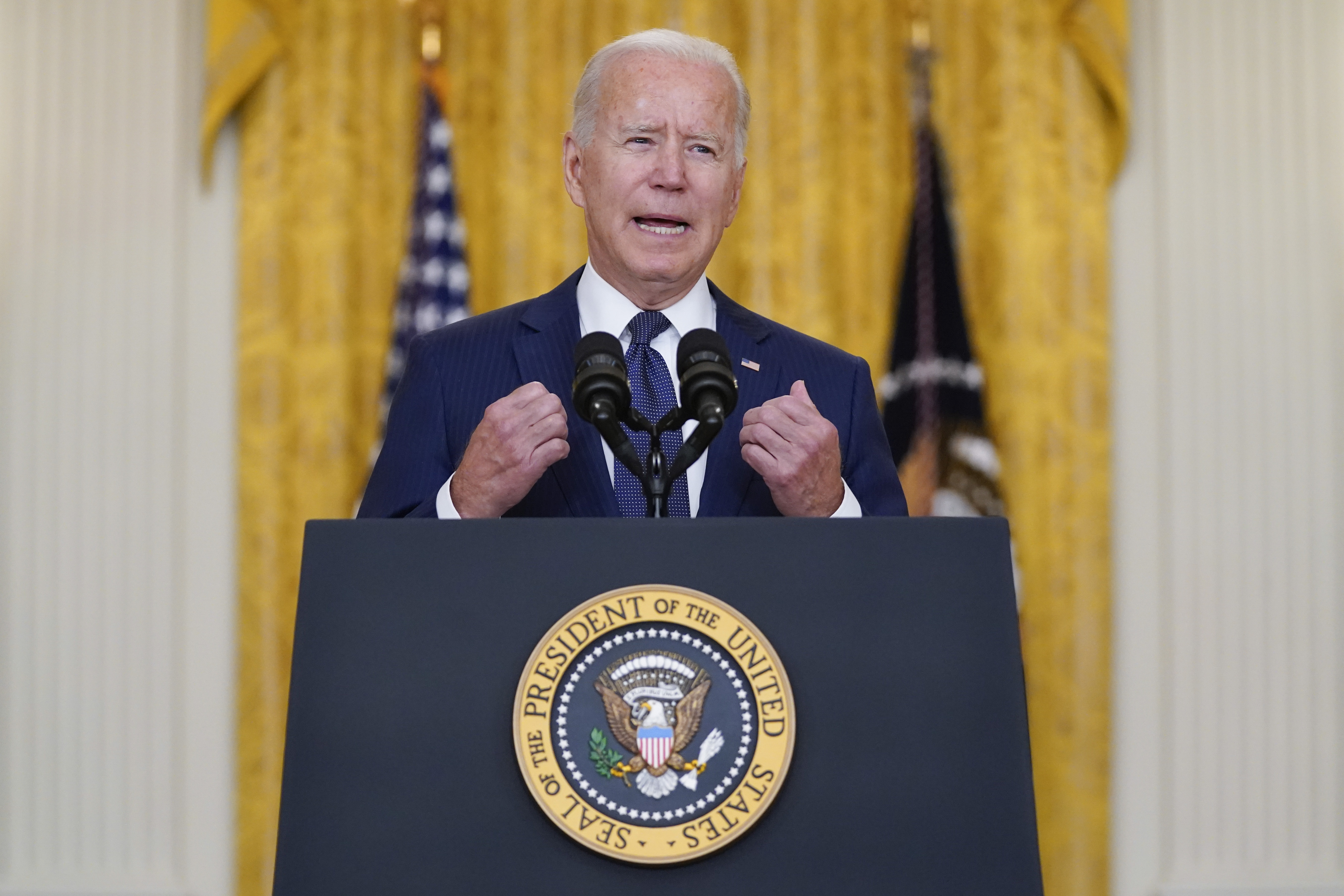 President Joe Biden speaks about the bombings at the Kabul airport that killed 13 U.S. service members, from the East Room of the White House on Thursday. The U.S. military struck back on Saturday.