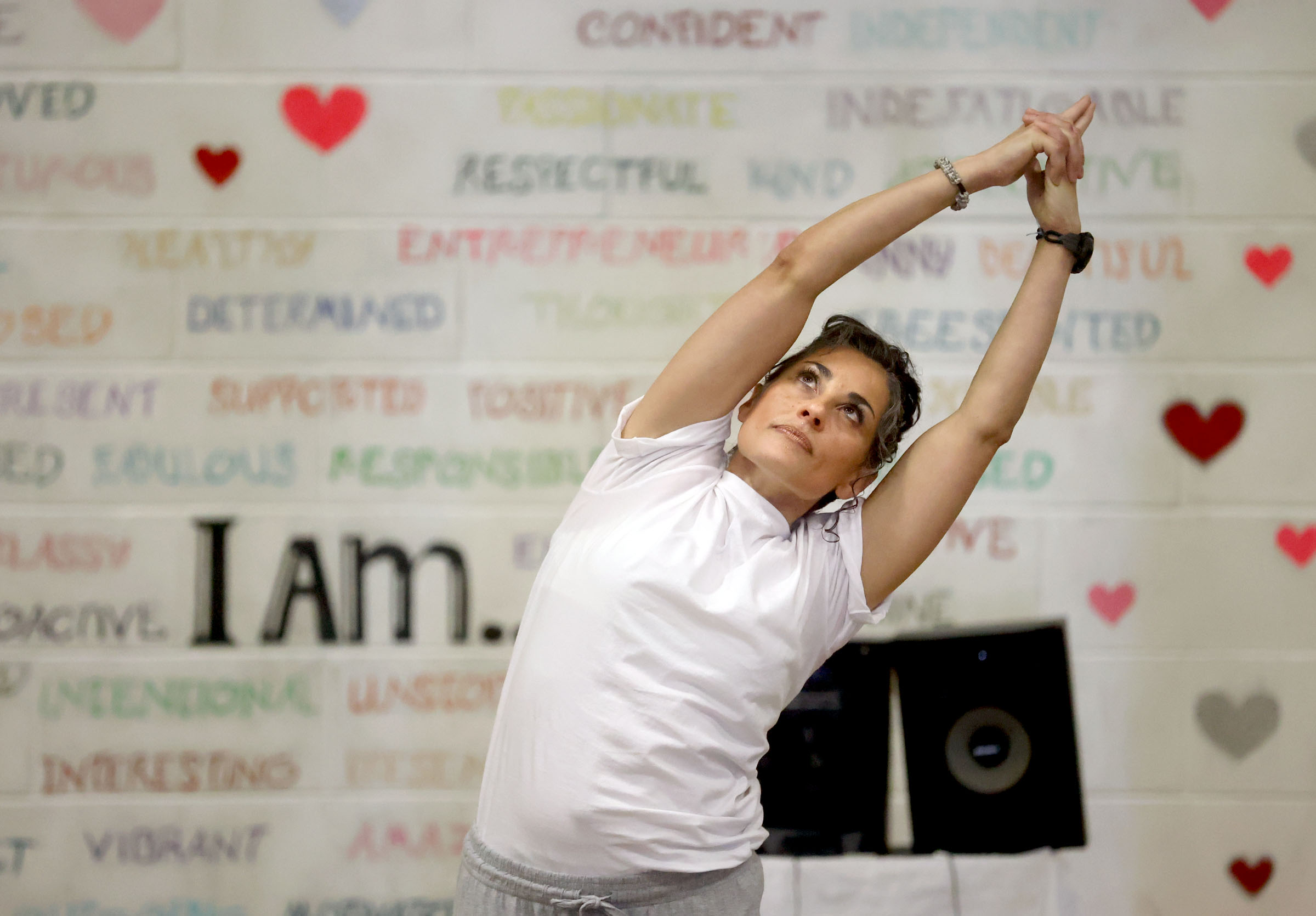 Inmate Fergosa Bluff teaches yoga at the Utah State Prison in Draper on Wednesday, Aug. 25, 2021. Bluff is the first inmate to complete 500 hours of yoga teacher training in prison.