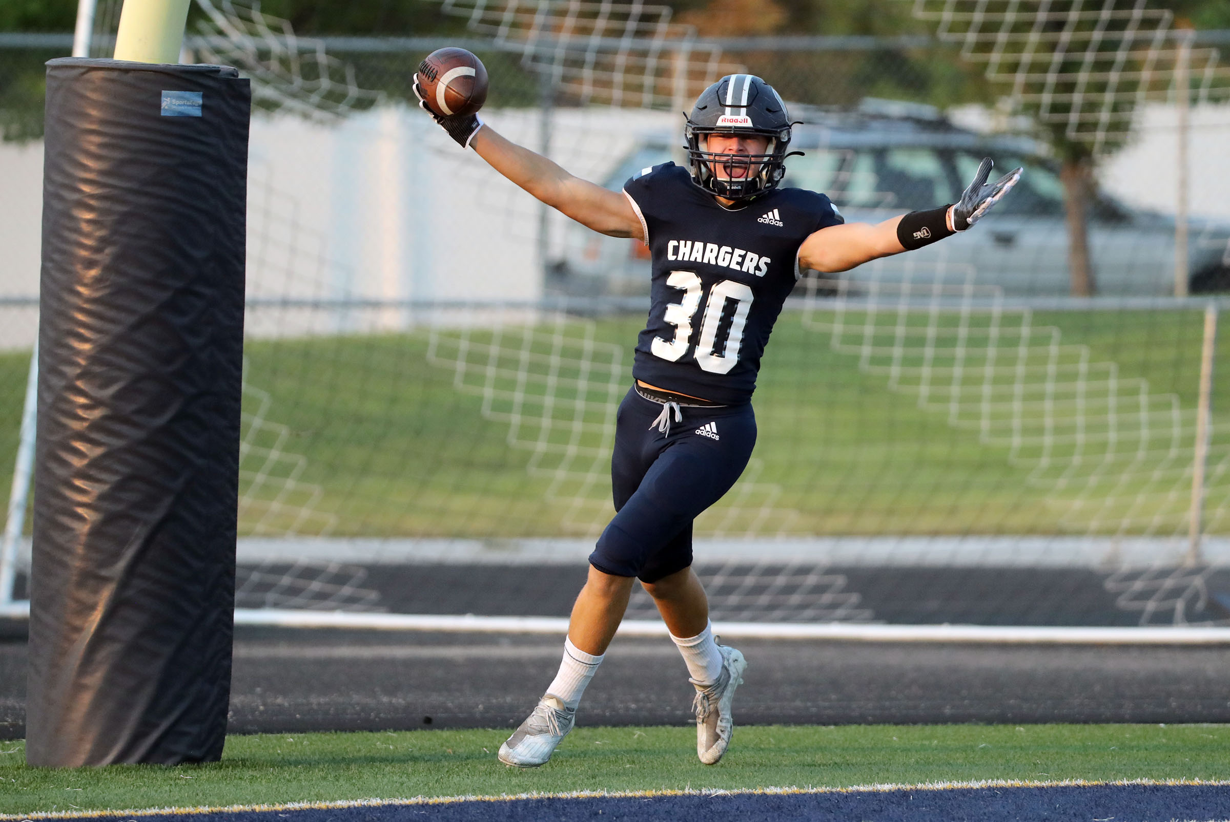 Corner Canyon's Dylan Carlsen celebrates a touchdown during a high school football game against Bingham at Corner Canyon High School in Draper on Friday, Aug. 27, 2021.