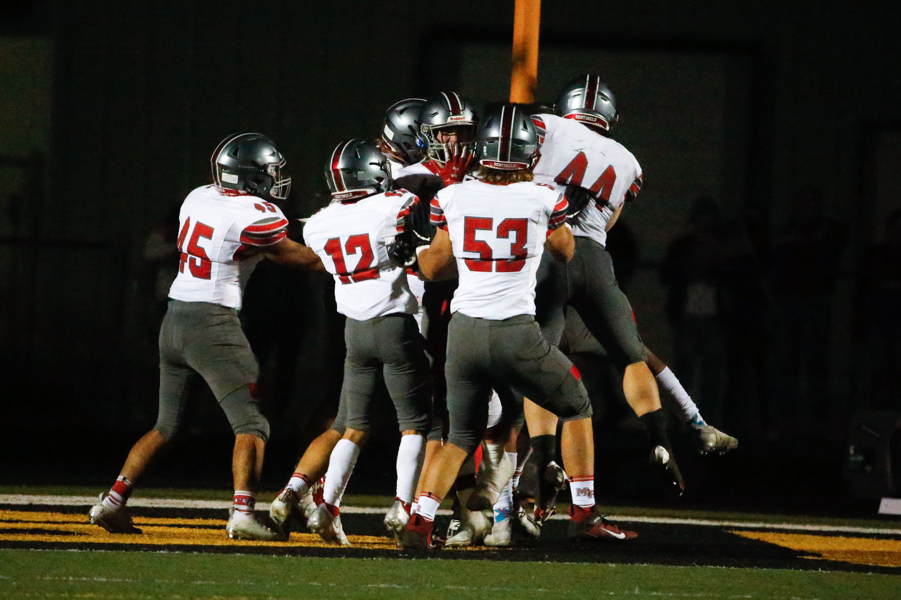 Mountain Ridge players celebrates after a touchdown during the third quarter of a high school football game against Wasatch High on Friday, Aug. 27, 2021, at Wasatch High School in Heber. Mountain Ridge won 40-30.