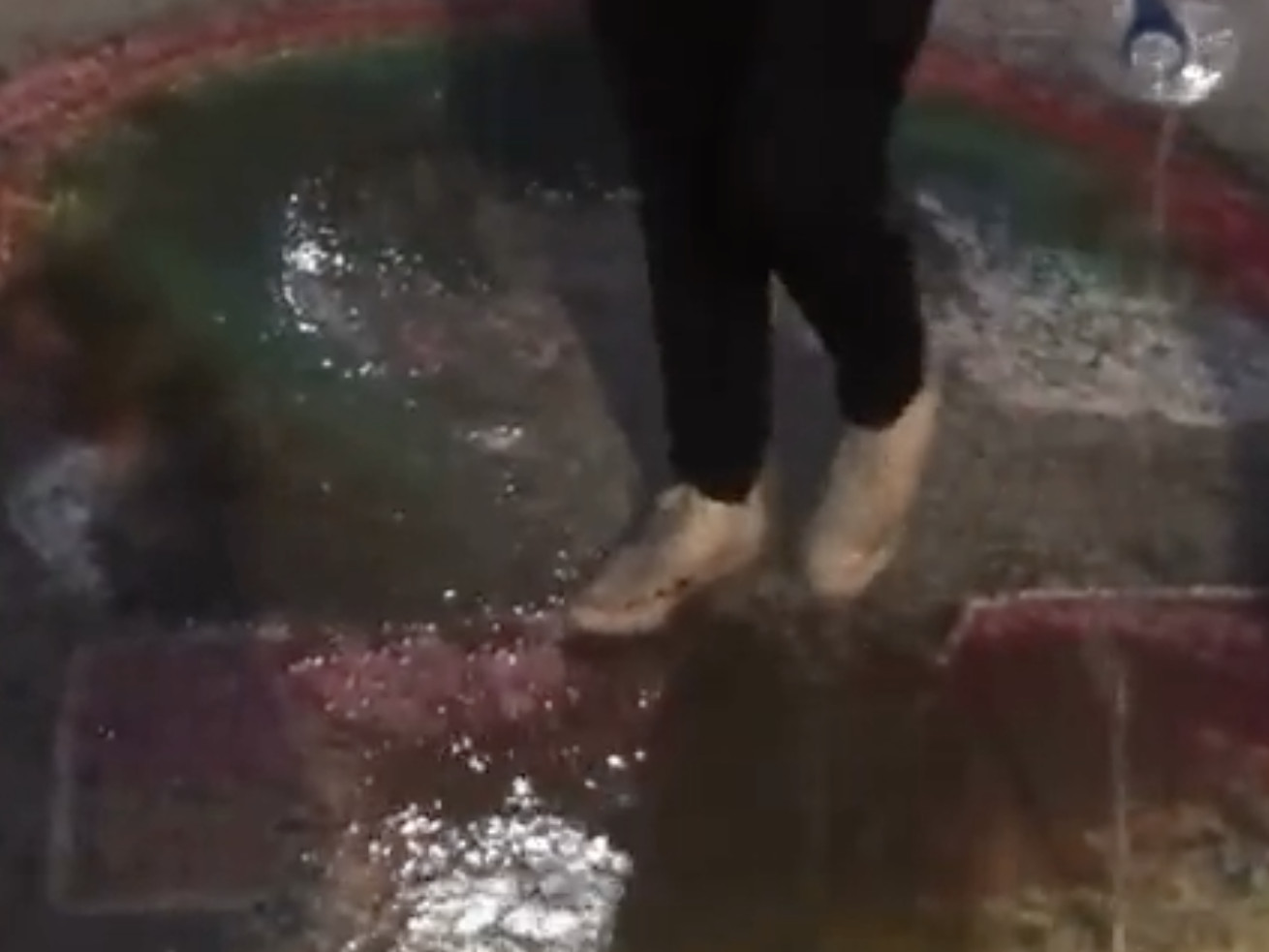 BYU issued a condemnation Friday of that actions and words of a student caught on video Thursday night using a
homophobic slur and pouring a jug of water on a rainbow Y symbol drawn in chalk on a sidewalk at the edge of campus.